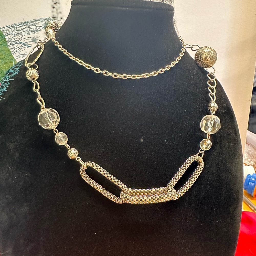 long silver tone necklace with crystal and metal pearls